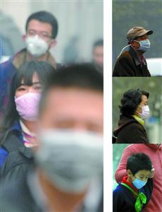口罩模式开启雾霾持续，大部分市民佩戴口罩出门