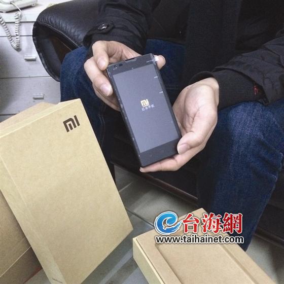 江先生买来的手机，简直以假乱真