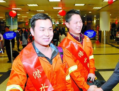 谭辉（左）和罗小明
