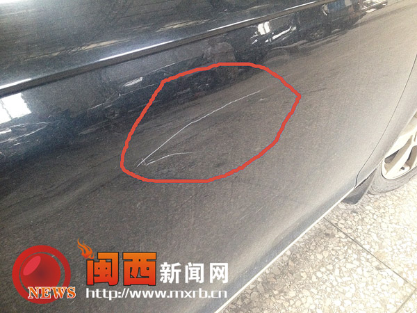 新罗：爱车小区内被划 物业公司是否需要担责？