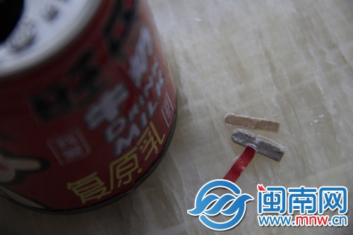 罐装旺仔牛奶 竟然喝出纸片