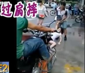 广东男子当街暴打妻子并过肩摔